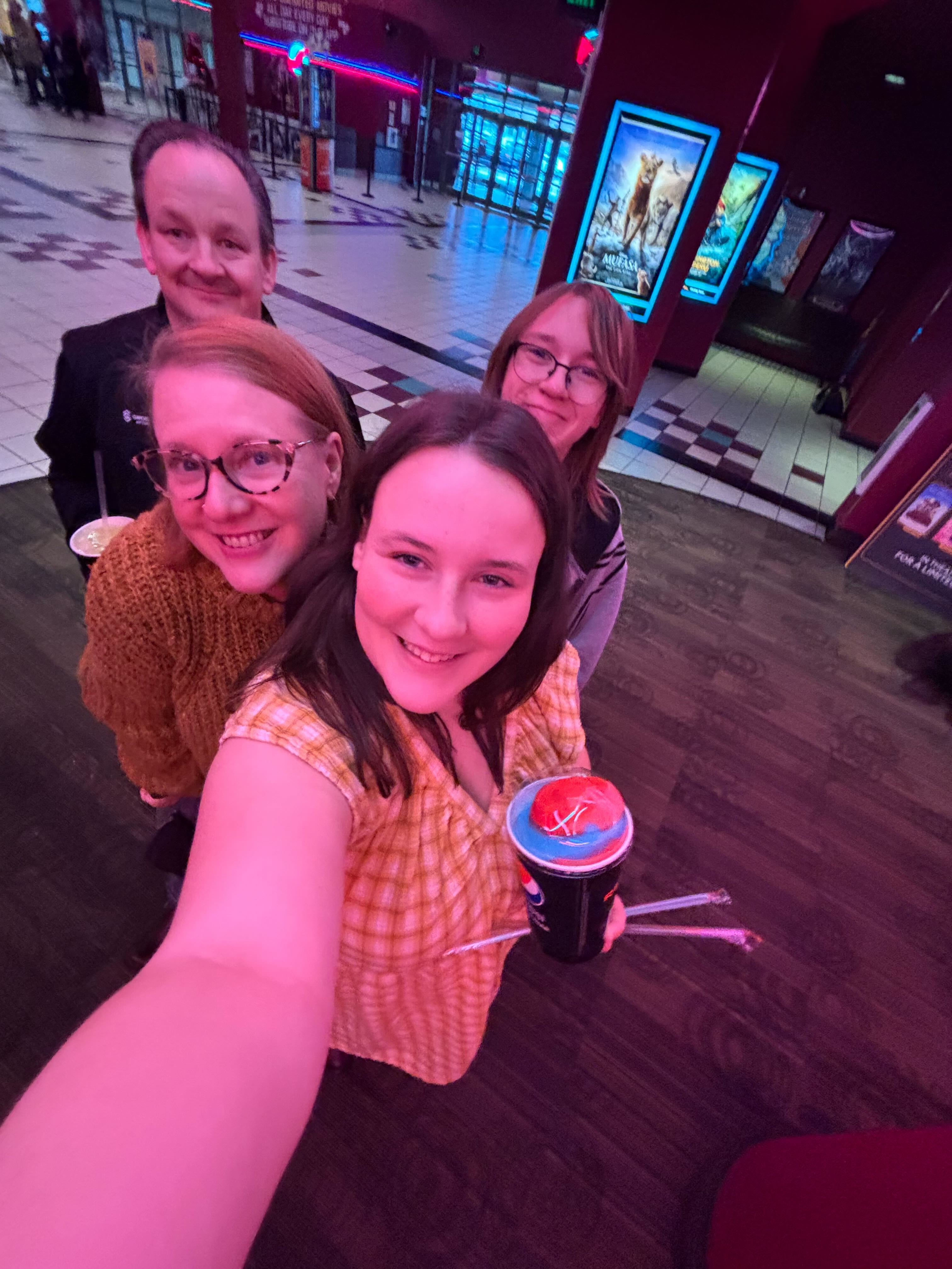 Amber Chandler at the movies with her husband and two children.