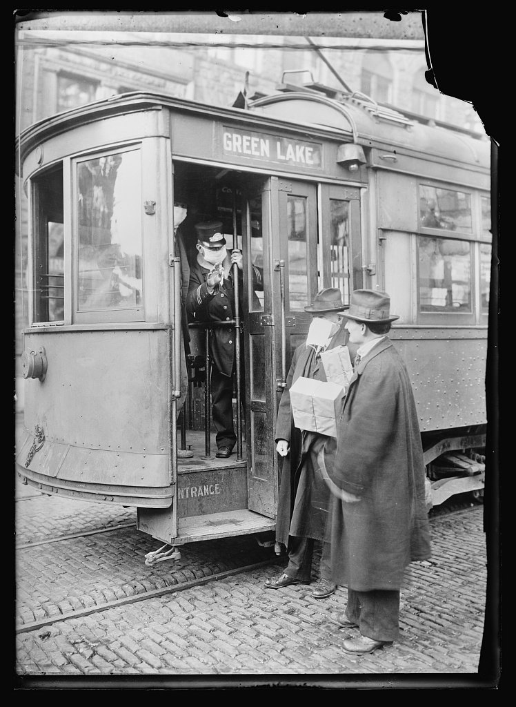 Precautions taken in Seattle, Wash., during the Spanish Influenza Epidemic would not permit anyone to ride on the street cars without wearing a mask. 260,000 of these were made by the Seattle Chapter of the Red Cross which consisted of 120 workers, in three days (detail), ca. 1918-1919.